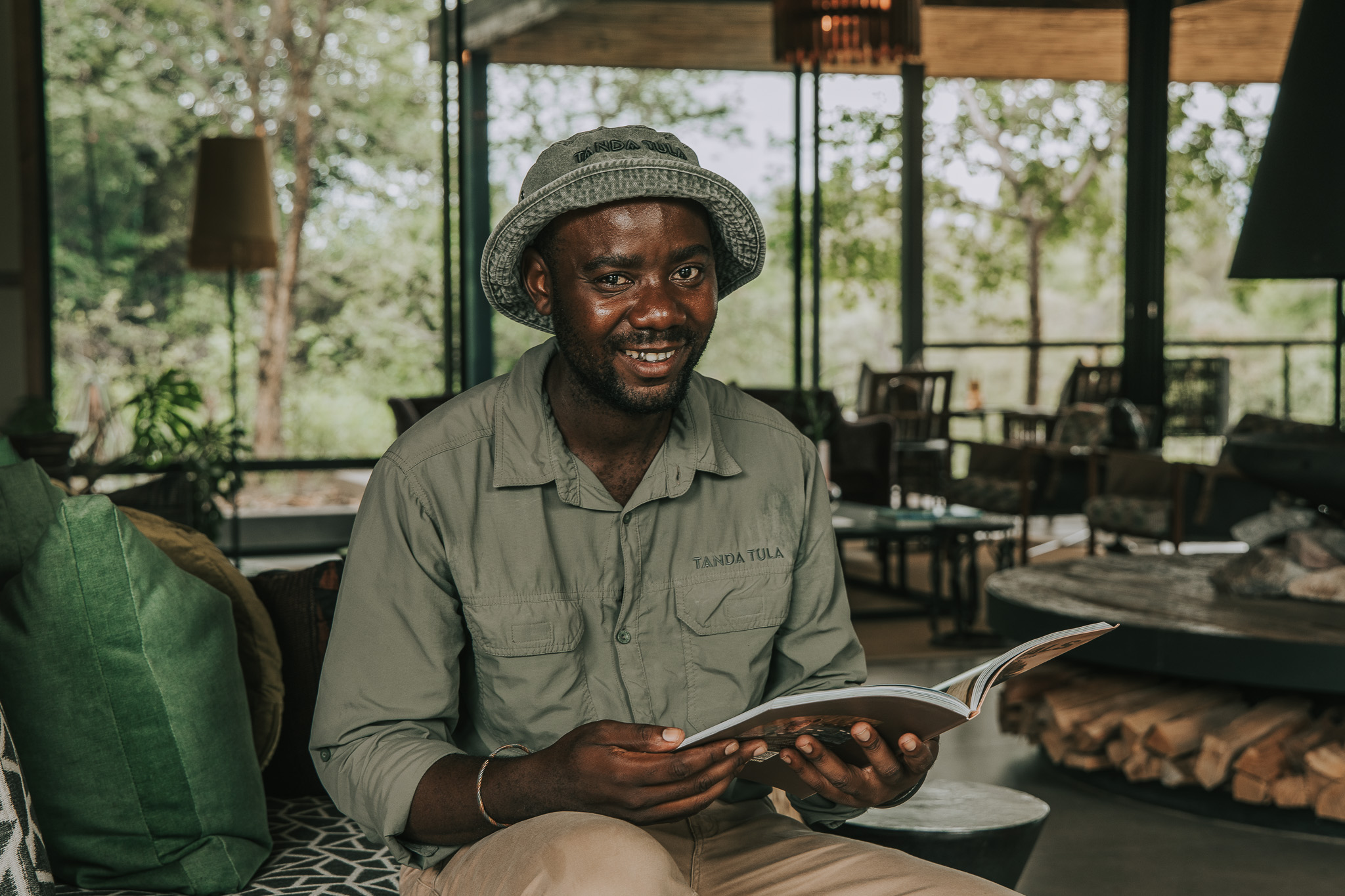 Expert tracker in the Timbavati skillfully reading animal tracks in the African bushveld