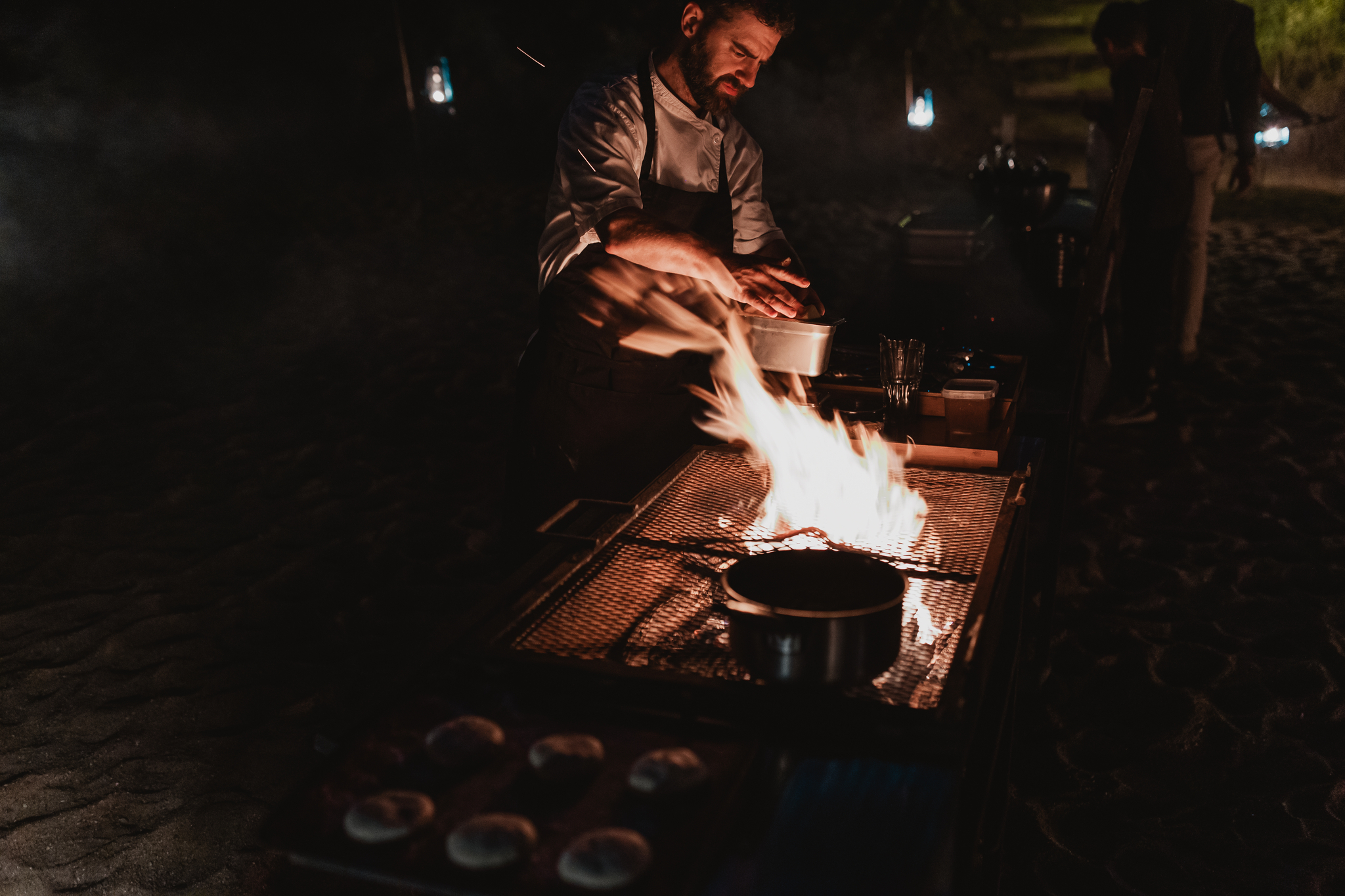 cooking over fire for a bush dinner