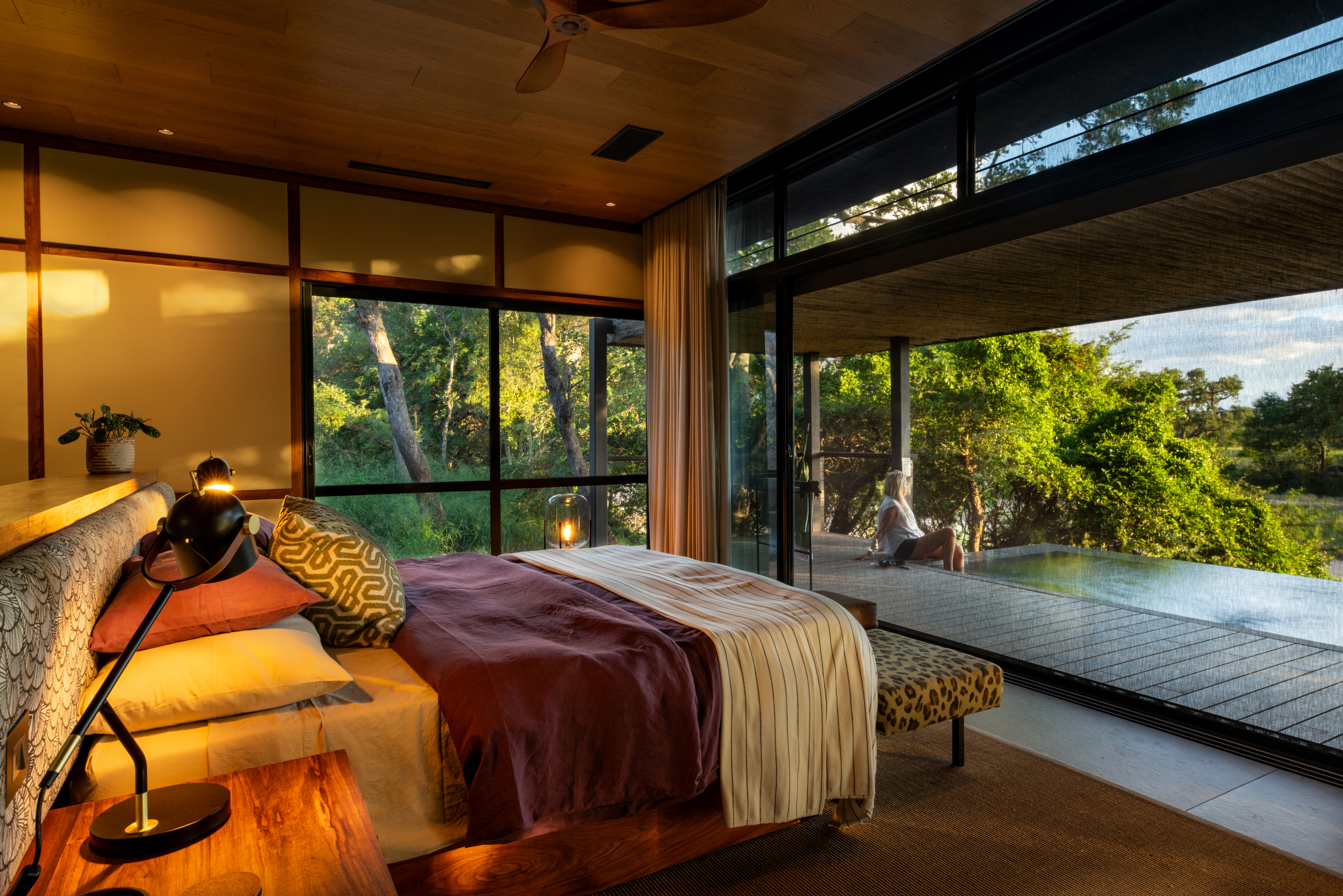 Luxury safari suite with private deck and plunge pool overlooking the wilderness.