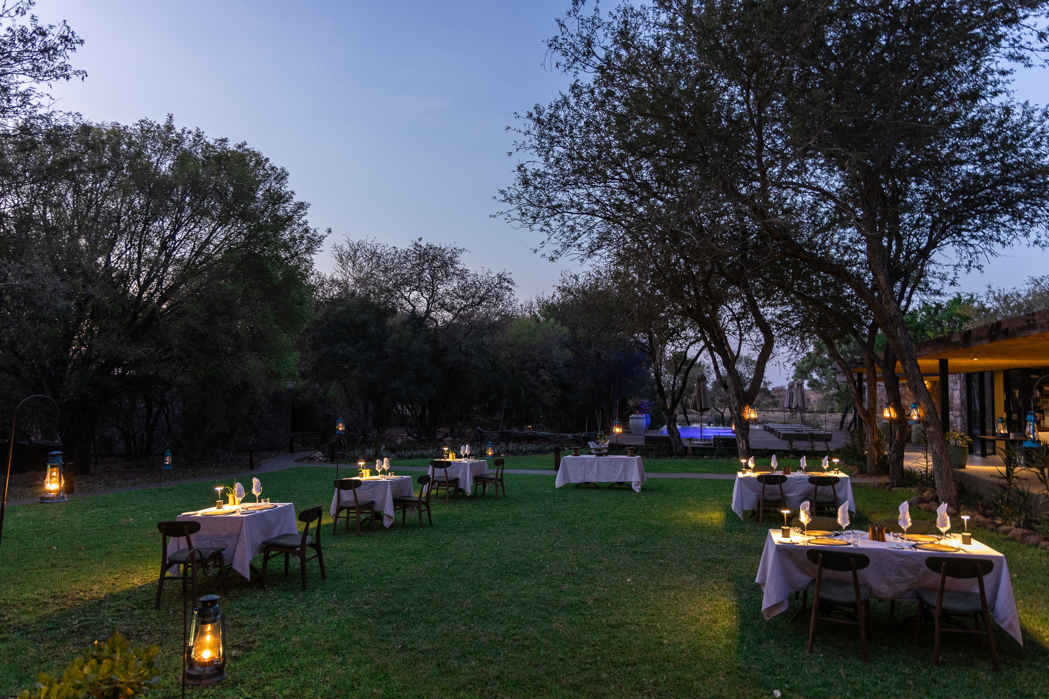 Outdoor dining table set at Tanda Tula Safari Camp.