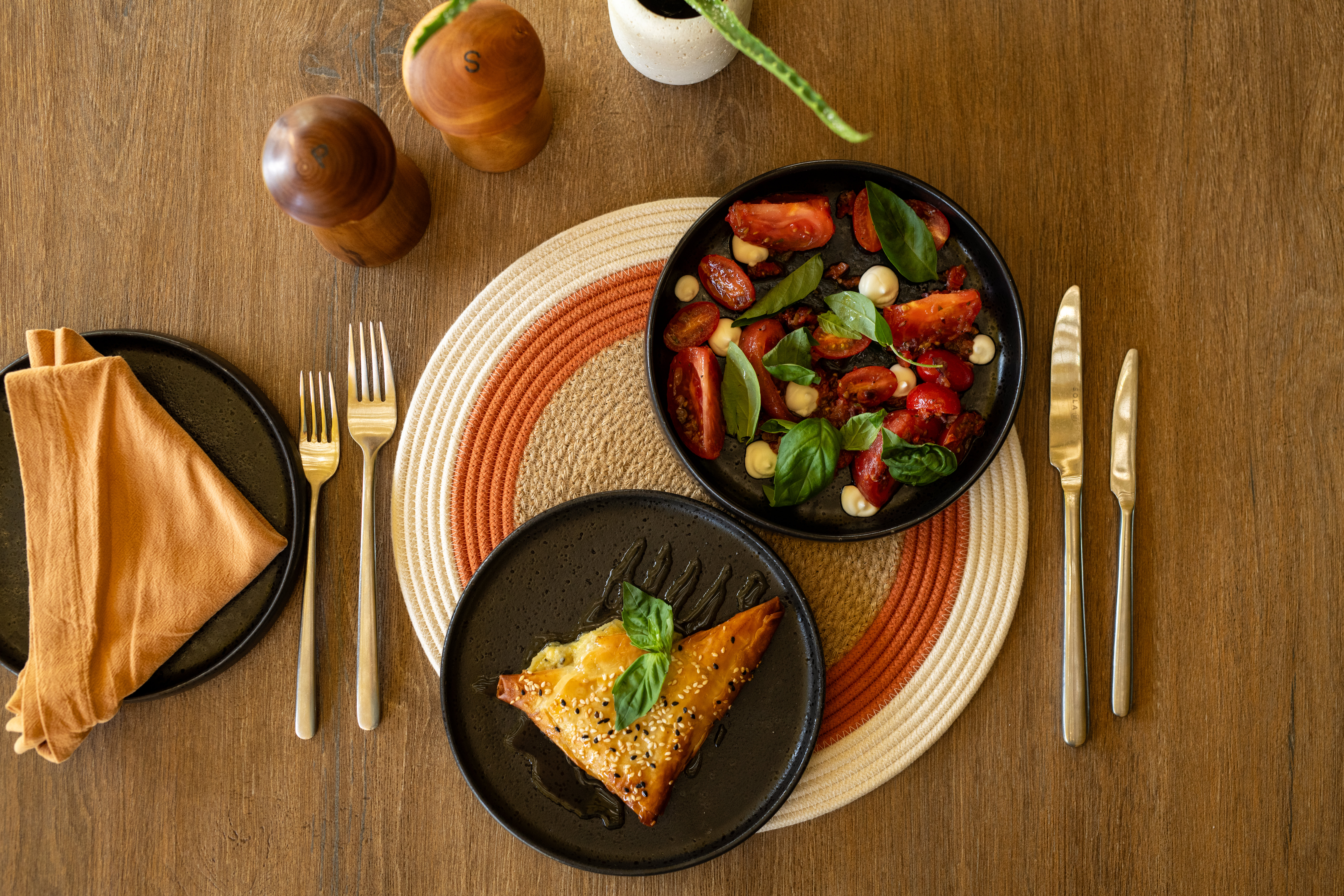 An overhead view of beautifully plated lunch dishes served at Tanda Tula.