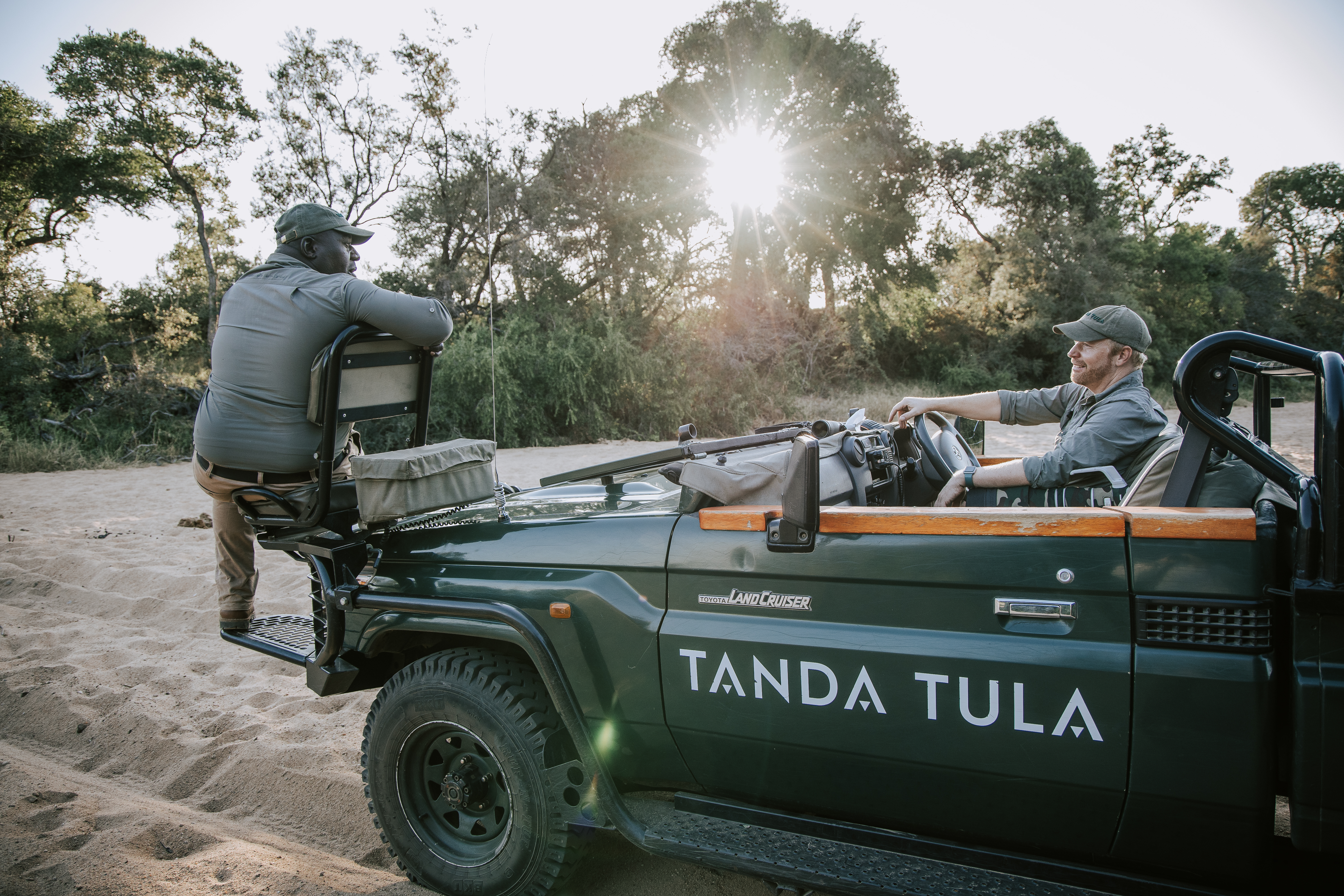 Guide and tracker working together on safari in the Timbavati