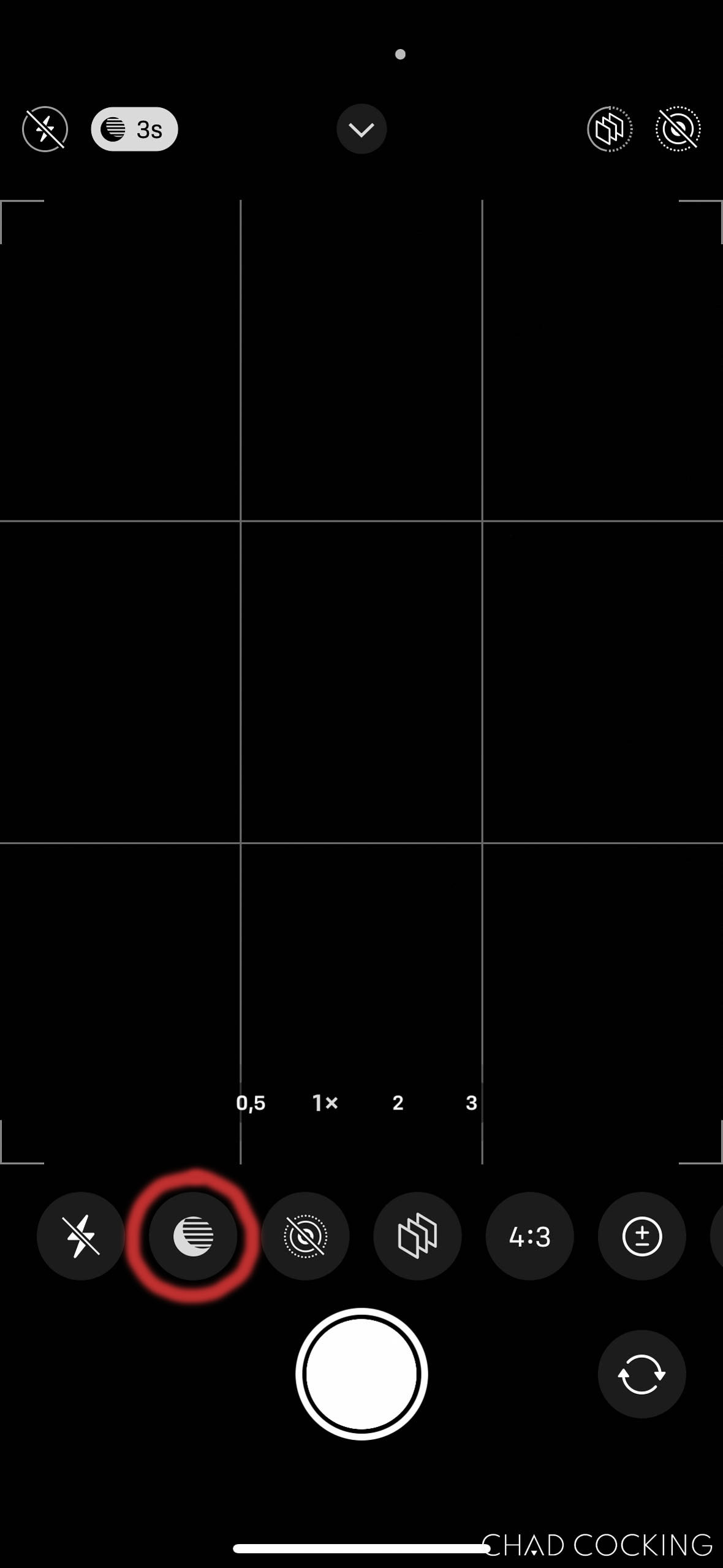 iPhone camera interface with the night mode icon highlighted.